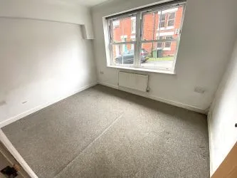 Block of Four Flats with Parking and Large Garage & Garden - Vacant Possession