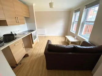 Block of Four Flats with Parking and Large Garage & Garden - Vacant Possession
