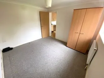 Block of Four Flats with Parking and Large Garage & Garden - Vacant Possession