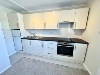 Town & Country Property Auctions are delighted to offer For Sale by Public Auction this Immaculate one bedroom first floor apartment situated in the popular location of Canford Heath.