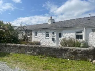 A Delightful Two Bedroom Semi-Detached Long Stone Cottage, Enjoying A Rural Position Within An Area Of Outstanding Natural Beauty Within 2 Miles Of Lligwy Beach, North Of Moelfre On The Beautiful Island Of Ynys Mon. An Ideal Family Home Or Investment Property