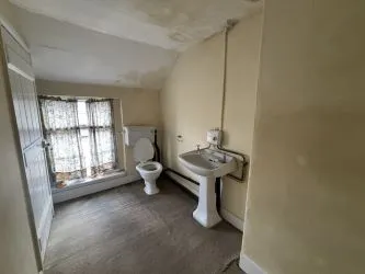 A three storey property with four rooms and a kitchen and bathroom, this Grade II listed property offers many opportunities for development.