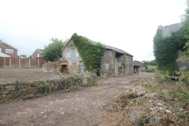 A Superb Plot Located In A Popular Residential Area Of Wrexham And Comprising The Grade II* Listed Plas Newydd together with a number of later buildings and outbuildings and large grounds. An Opportunity To Create A Significant Development, Subject To Consents.