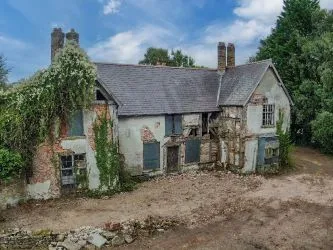 A Superb Plot Located In A Popular Residential Area Of Wrexham And Comprising The Grade II* Listed Plas Newydd together with a number of later buildings and outbuildings and large grounds. An Opportunity To Create A Significant Development, Subject To Consents.