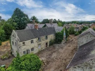 A Superb Plot Located In A Popular Residential Area Of Wrexham And Comprising The Grade II* Listed Plas Newydd together with a number of later buildings and outbuildings and large grounds. An Opportunity To Create A Significant Development, Subject To Consents.