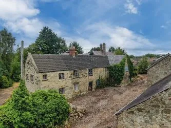 A Superb Plot Located In A Popular Residential Area Of Wrexham And Comprising The Grade II* Listed Plas Newydd together with a number of later buildings and outbuildings and large grounds. An Opportunity To Create A Significant Development, Subject To Consents.