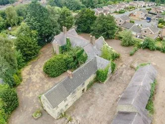 A Superb Plot Located In A Popular Residential Area Of Wrexham And Comprising The Grade II* Listed Plas Newydd together with a number of later buildings and outbuildings and large grounds. An Opportunity To Create A Significant Development, Subject To Consents.