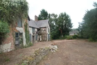 A Superb Plot Located In A Popular Residential Area Of Wrexham And Comprising The Grade II* Listed Plas Newydd together with a number of later buildings and outbuildings and large grounds. An Opportunity To Create A Significant Development, Subject To Consents.