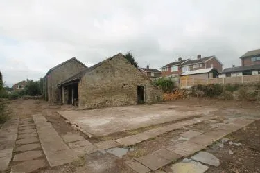 A Superb Plot Located In A Popular Residential Area Of Wrexham And Comprising The Grade II* Listed Plas Newydd together with a number of later buildings and outbuildings and large grounds. An Opportunity To Create A Significant Development, Subject To Consents.