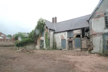 A Superb Plot Located In A Popular Residential Area Of Wrexham And Comprising The Grade II* Listed Plas Newydd together with a number of later buildings and outbuildings and large grounds. An Opportunity To Create A Significant Development, Subject To Consents.