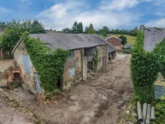 A Superb Plot Located In A Popular Residential Area Of Wrexham And Comprising The Grade II* Listed Plas Newydd together with a number of later buildings and outbuildings and large grounds. An Opportunity To Create A Significant Development, Subject To Consents.