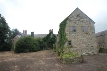 A Superb Plot Located In A Popular Residential Area Of Wrexham And Comprising The Grade II* Listed Plas Newydd together with a number of later buildings and outbuildings and large grounds. An Opportunity To Create A Significant Development, Subject To Consents.