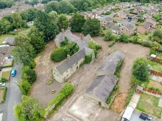 A Superb Plot Located In A Popular Residential Area Of Wrexham And Comprising The Grade II* Listed Plas Newydd together with a number of later buildings and outbuildings and large grounds. An Opportunity To Create A Significant Development, Subject To Consents.