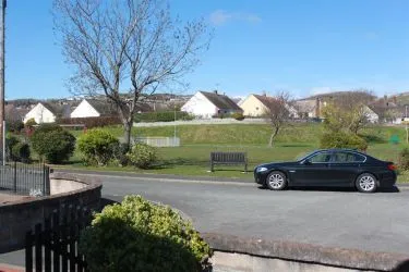 THIS BEAUTIFULLY PRESENTED 2/3 BEDROOM SEMI DETACHED DORMER BUNGALOW IS SITUATED TOWARDS THE END OF A CUL-DE-SAC OVERLOOKING THE GREEN, within an easy access of local village shops of Penrhyn Bay, Promenade, bus services, local Family Practitioners and Chemist.
