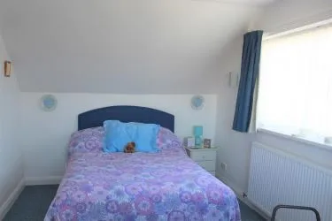 THIS BEAUTIFULLY PRESENTED 2/3 BEDROOM SEMI DETACHED DORMER BUNGALOW IS SITUATED TOWARDS THE END OF A CUL-DE-SAC OVERLOOKING THE GREEN, within an easy access of local village shops of Penrhyn Bay, Promenade, bus services, local Family Practitioners and Chemist.