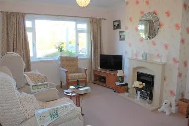 THIS BEAUTIFULLY PRESENTED 2/3 BEDROOM SEMI DETACHED DORMER BUNGALOW IS SITUATED TOWARDS THE END OF A CUL-DE-SAC OVERLOOKING THE GREEN, within an easy access of local village shops of Penrhyn Bay, Promenade, bus services, local Family Practitioners and Chemist.