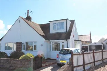 THIS BEAUTIFULLY PRESENTED 2/3 BEDROOM SEMI DETACHED DORMER BUNGALOW IS SITUATED TOWARDS THE END OF A CUL-DE-SAC OVERLOOKING THE GREEN, within an easy access of local village shops of Penrhyn Bay, Promenade, bus services, local Family Practitioners and Chemist.