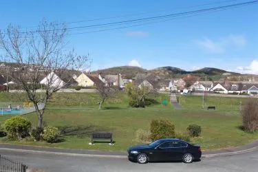 THIS BEAUTIFULLY PRESENTED 2/3 BEDROOM SEMI DETACHED DORMER BUNGALOW IS SITUATED TOWARDS THE END OF A CUL-DE-SAC OVERLOOKING THE GREEN, within an easy access of local village shops of Penrhyn Bay, Promenade, bus services, local Family Practitioners and Chemist.