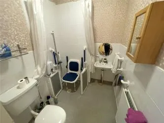 A two bedroom ground floor apartment in need of refurbishment.