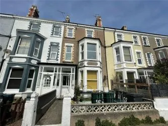 A two bedroom ground floor apartment in need of refurbishment.