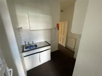 A two bedroom ground floor apartment in need of refurbishment.