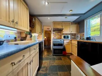 4 Tai Newyddion is a charming 4 bedroom semi-detached property, standing within the centre of the village of Llanfachreth. Enjoying well-proportioned accommodation, with a side and front garden.