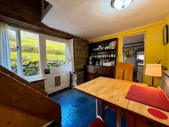 4 Tai Newyddion is a charming 4 bedroom semi-detached property, standing within the centre of the village of Llanfachreth. Enjoying well-proportioned accommodation, with a side and front garden.