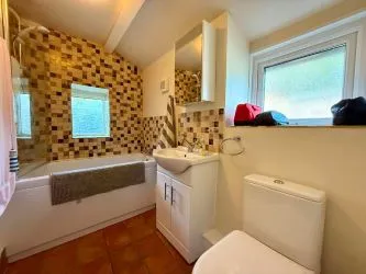 4 Tai Newyddion is a charming 4 bedroom semi-detached property, standing within the centre of the village of Llanfachreth. Enjoying well-proportioned accommodation, with a side and front garden.