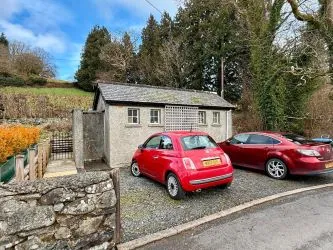 4 Tai Newyddion is a charming 4 bedroom semi-detached property, standing within the centre of the village of Llanfachreth. Enjoying well-proportioned accommodation, with a side and front garden.
