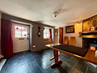 4 Tai Newyddion is a charming 4 bedroom semi-detached property, standing within the centre of the village of Llanfachreth. Enjoying well-proportioned accommodation, with a side and front garden.