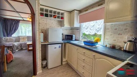 Static 6 Berth Caravan On A Good Sized Plot On The Llyn Peninsula, Including Off Road Parking And With Distant Sea Views. Local Beaches Are Within Easy Reach.