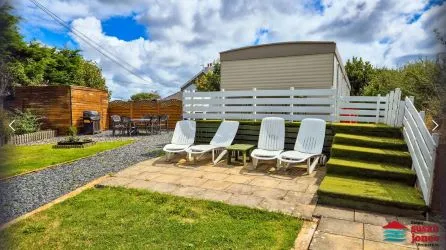 Static 6 Berth Caravan On A Good Sized Plot On The Llyn Peninsula, Including Off Road Parking And With Distant Sea Views. Local Beaches Are Within Easy Reach.