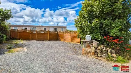 Static 6 Berth Caravan On A Good Sized Plot On The Llyn Peninsula, Including Off Road Parking And With Distant Sea Views. Local Beaches Are Within Easy Reach.