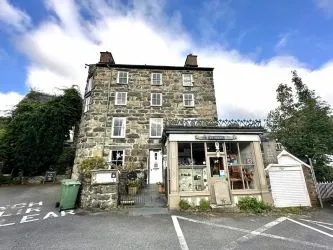 ***RECENTLY ON THE MARKET AT £495,000**** Ty Seren is a substantial, 8 Bedroomed Grade II Listed property of traditional stone construction under a slated rood, standing 100 yards from the main town square.