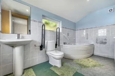 A Landmark Coastal Residence with Untapped Potential and Panoramic Sea Views!