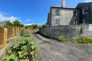 A Landmark Coastal Residence with Untapped Potential and Panoramic Sea Views!