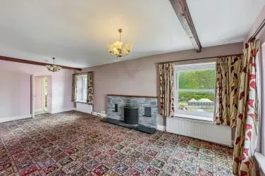 A Landmark Coastal Residence with Untapped Potential and Panoramic Sea Views!