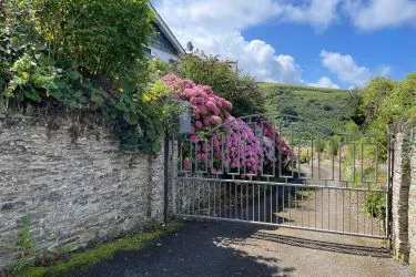 A Landmark Coastal Residence with Untapped Potential and Panoramic Sea Views!