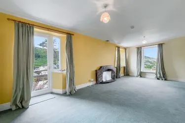 A Landmark Coastal Residence with Untapped Potential and Panoramic Sea Views!