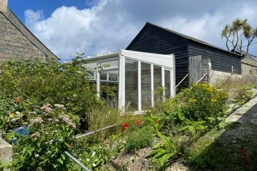 A Landmark Coastal Residence with Untapped Potential and Panoramic Sea Views!