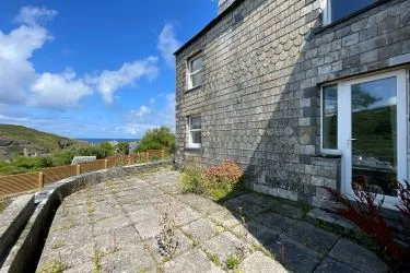 A Landmark Coastal Residence with Untapped Potential and Panoramic Sea Views!