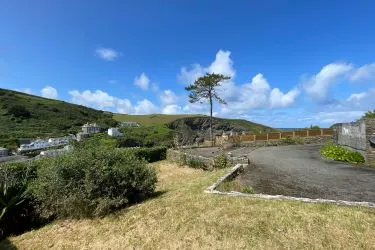 A Landmark Coastal Residence with Untapped Potential and Panoramic Sea Views!