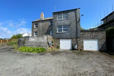 A Landmark Coastal Residence with Untapped Potential and Panoramic Sea Views!