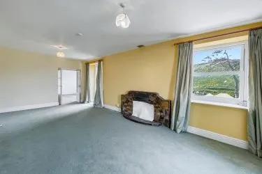 A Landmark Coastal Residence with Untapped Potential and Panoramic Sea Views!