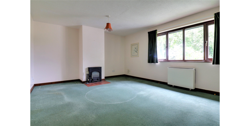 3 Bedroom detached bungalow in a peaceful village location with parking, garage and private wraparound gardens