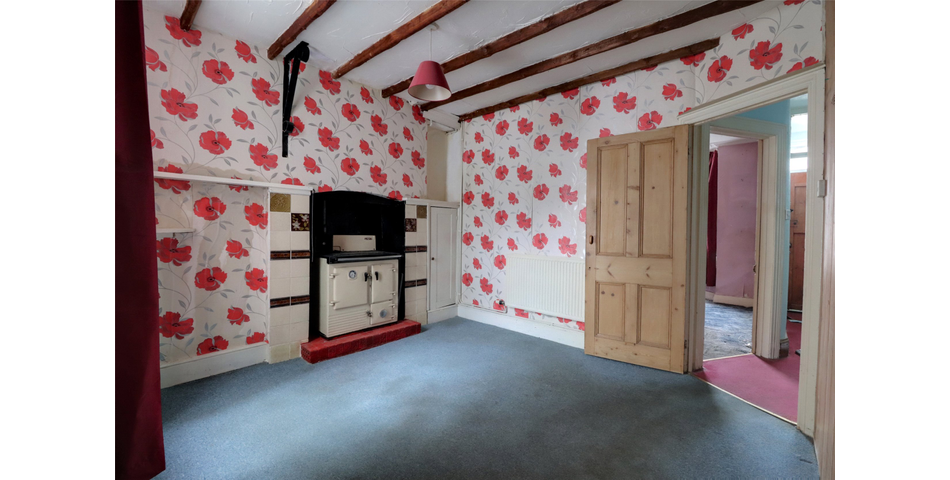 End terrace family home in need of modernisation and updating, centrally located and with the benefit of a garage and parking space