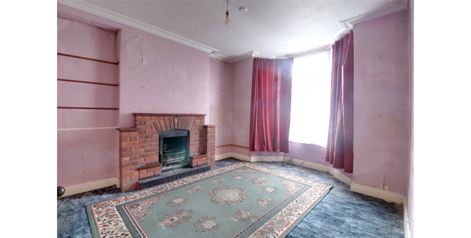 End terrace family home in need of modernisation and updating, centrally located and with the benefit of a garage and parking space