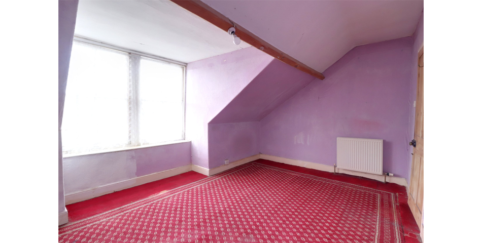 End terrace family home in need of modernisation and updating, centrally located and with the benefit of a garage and parking space