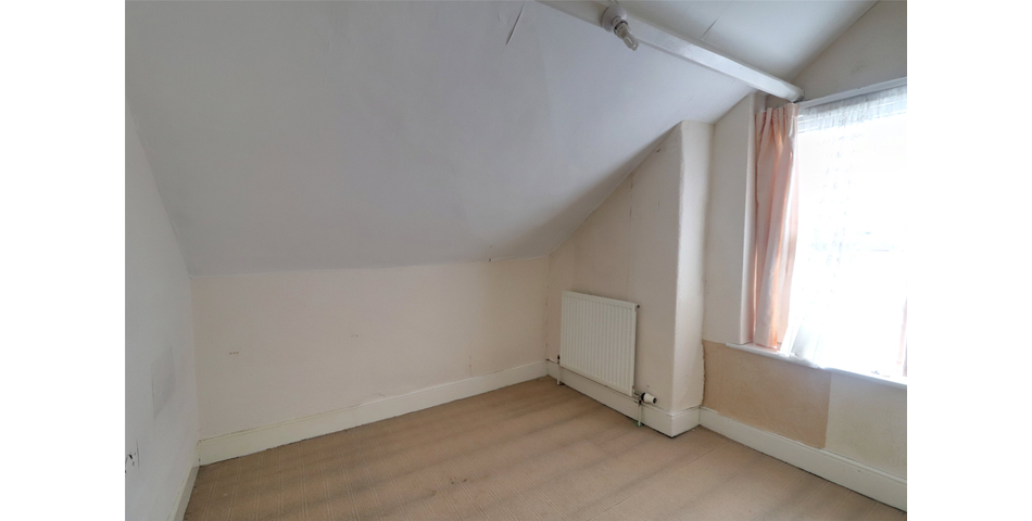 End terrace family home in need of modernisation and updating, centrally located and with the benefit of a garage and parking space