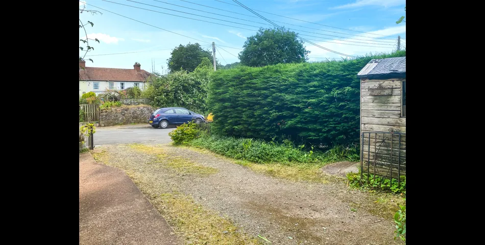 Village Location on the Edge of the Exmoor National Park 3 BedroomsPretty Garden and Parking In Need of Modernisation